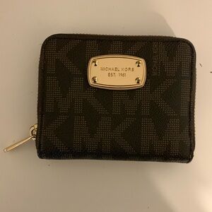 Michael kohrs signature wallet, excellent condition.